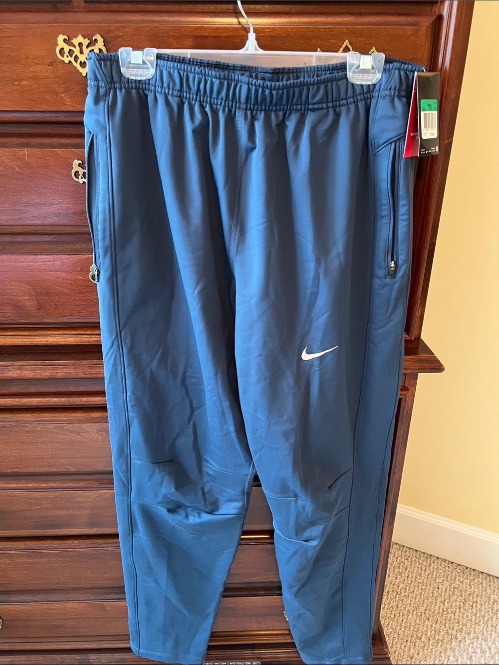 Nike Men's Blue Performance Joggers with White Swoosh